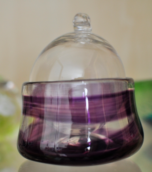 Purple glass bowl and bauble